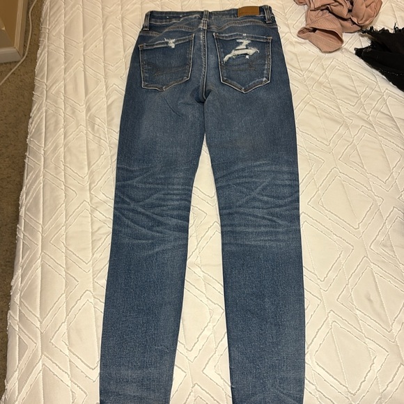 Skinny jeans, with 2 holes - Picture 2 of 3